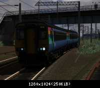 Class 156 heads towards Wrabness